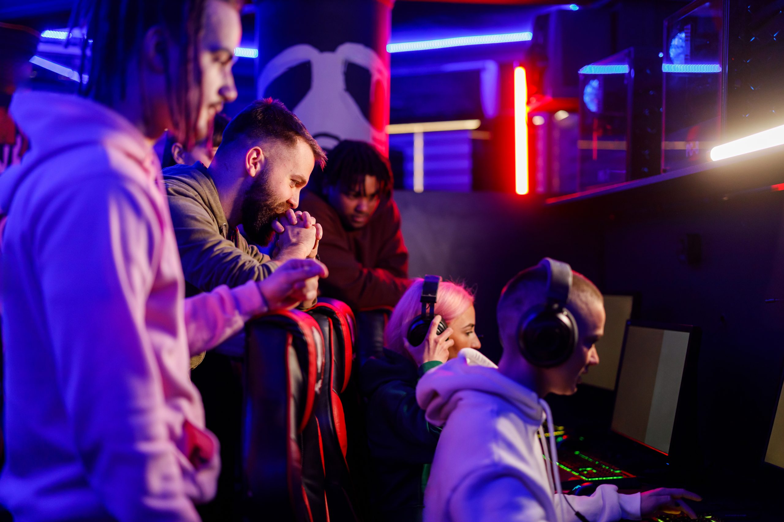 team of gamers in internet cafe playing online vid 2024 03 25 23 52 41 utc scaled